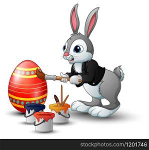 Vector illustration of Easter bunny painting easter egg