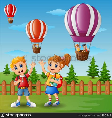 Vector illustration of School of a boy and a girl waving hand outside the fence with a hot air balloon