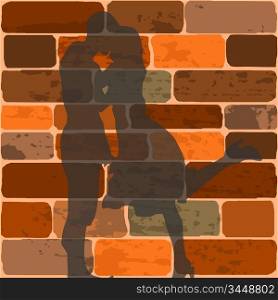 Vector illustration of the shadow of teenagers kissing on a brick wall