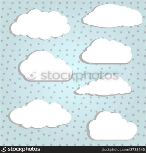 Vector illustration of white clouds in polka background