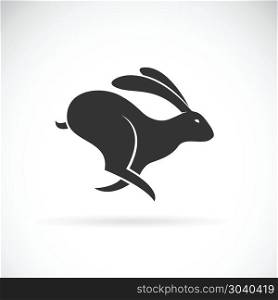 Vector of black rabbit is running on white background. Wild Anim. Vector of black rabbit is running on white background. Wild Animals. Black bunny. Easy editable layered vector illustration.