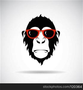 Vector of monkey head wearing glasses on white background. Wild Animals. Fashion. Easy editable layered vector illustration.