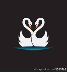 Vector of two white swan design on black background. Wild Animals. Birds. Easy editable layered vector illustration.
