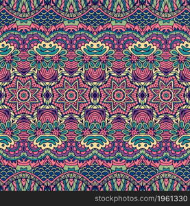 Vector seamless pattern. Ethnic boho geometric psychedelic colorful print with doodle graphic flowers and ornaments.. Tribal vintage abstract geometric ethnic boho seamless pattern ornamental