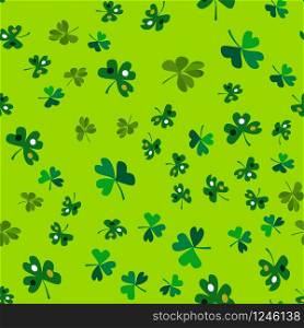 Vector seamless pattern of shamrocks on a dark background. Green leaves of clover are randomly scattered in the pattern. Stock Illustration for packing gifts for St. Patrick&rsquo;s Day. Repeating editable vector pattern. EPS 10. Vector seamless pattern of shamrocks on a dark background