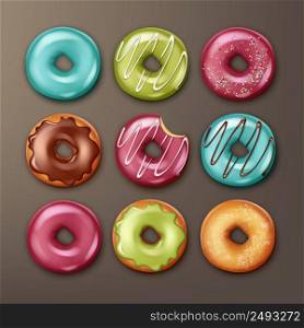 Vector set of different donuts with pink, blue, green, brown icing, white stripes and sprinkles top view isolated on background. Set of donuts