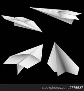 Vector set of paper planes isolated on black background.