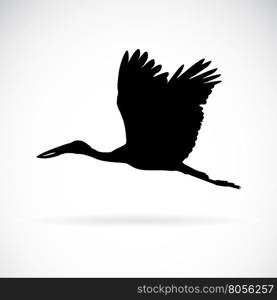 Vector silhouettes of stork flight on white background.