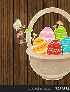 Vector wooden Easter background with eggs in basket