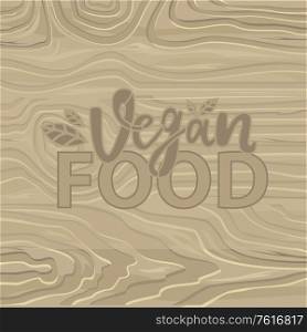 Vegan food lettering on wooden background. Vector backdrop with organic vegetarian products inscription, cutting board and letterpress or print, woodcut for menu. Vegan Food Lettering on Wooden Background. Vector