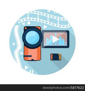 Video camera with cinema tape on background and memory card cartoon flat design long shadow style