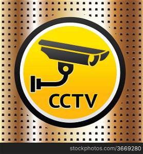 Video surveillance symbol on a golden background