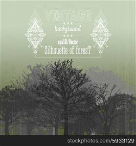 Vintage forest background with tribal style frame and place for text. Vector illustration. Vintage forest background with tribal style frame and place for text. Vector illustration.
