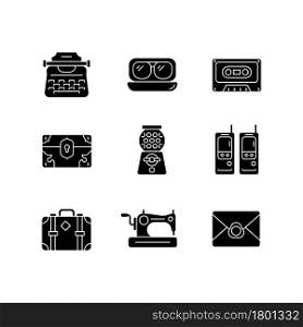 Vintage-inspired style black glyph icons set on white space. Typewriter model. Aviator sunglasses. Tape cassette. Treasure chest. Candy dispenser. Silhouette symbols. Vector isolated illustration. Vintage-inspired style black glyph icons set on white space