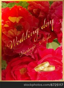 Vintage wedding card with rings and red roses.