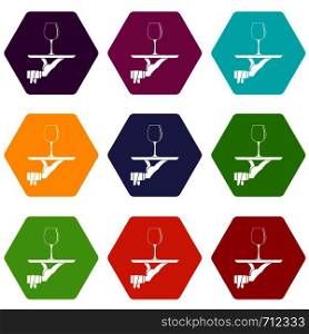 Waiter hand holding tray with wine glass icon set many color hexahedron isolated on white vector illustration. Waiter hand holding tray with wine glass icon set color hexahedron