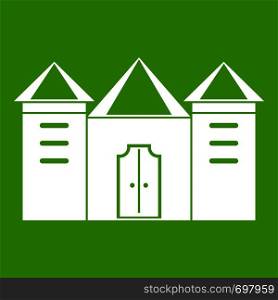 Wall and gate of the old fortress icon white isolated on green background. Vector illustration. Wall and gate of the old fortress icon green