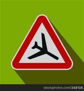 Warning sign of low flying aircraft icon in flat style on a green background. Warning sign of low flying aircraft icon