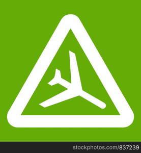 Warning sign of low flying aircraft icon white isolated on green background. Vector illustration. Warning sign of low flying aircraft icon green