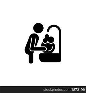 Wash dishes black glyph icon. Man washing dirty dishes in sink. Commonplace household duties, chores. Day-to-day routine. Silhouette symbol on white space. Vector isolated illustration. Wash dishes black glyph icon