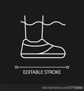 Water shoes white linear icon for dark theme. Walking in wet, rocky environments. Protecting feet. Thin line customizable illustration. Isolated vector contour symbol for night mode. Editable stroke. Water shoes white linear icon for dark theme