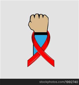Wearing a red ribbon that means AIDS. World AIDS Day.