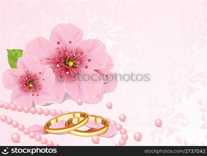 Wedding rings and cherry blossom
