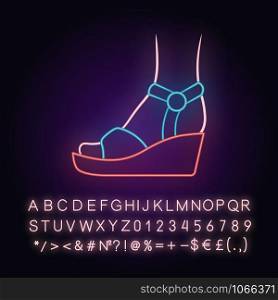 Wedges neon light icon. Woman stylish footwear design. Female casual shoes, summer sandals with platform heel side view. Glowing sign with alphabet, numbers and symbols. Vector isolated illustration