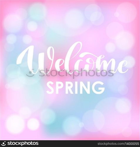 Welcome Spring. Hand drawn calligraphy and brush pen lettering on light blue and fresh pink blured background with bokeh. Design for holiday greeting card, invitation, posters, sale, banners. Welcome Spring. Hand drawn calligraphy and brush pen lettering on light blue sky blured background with bokeh.