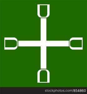 Wheel wrench cross icon white isolated on green background. Vector illustration. Wheel wrench cross icon green