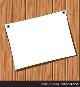 White blank paper on a wooden wall