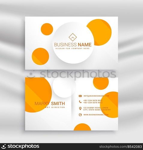 white business card with yellow circles