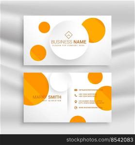 white business card with yellow circles