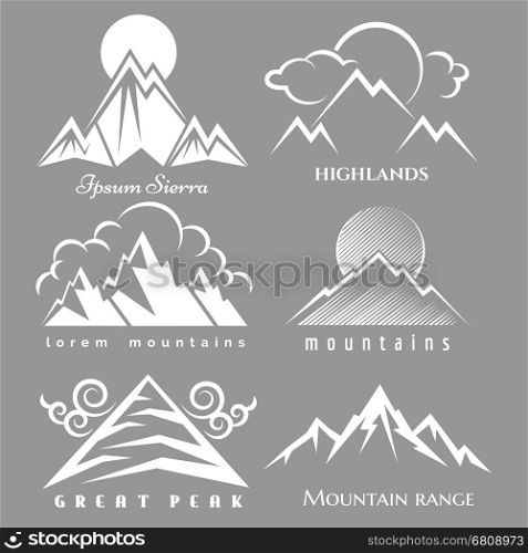 White mountain logo set. White mountain logo set isolated on grey backdrop. Vector nature labels collection