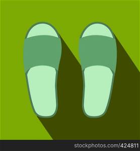White spa slippers flat icon on a green background. White spa slippers icon