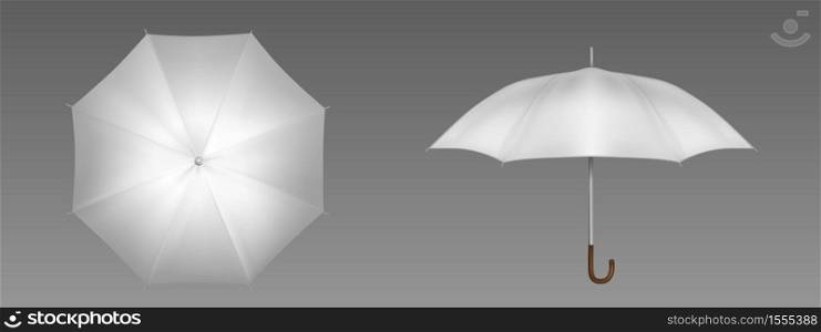 White umbrella front and top view. Vector realistic mockup of blank parasol with wooden handle, classic accessory for rain protection in spring, autumn or monsoon season. Realistic white umbrella front and top view