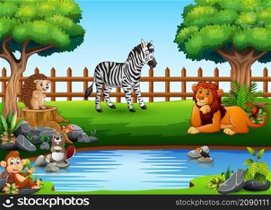 Wild animals playing on the edge of a beautiful small pond