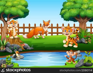 Wild animals playing on the edge of a beautiful small pond