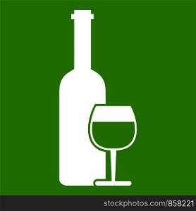 Wine bottle and glass icon white isolated on green background. Vector illustration. Wine bottle and glass icon green
