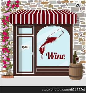 Wine shop building.. Wine shop building.Facade of stone. barrel with bottle and glass on it at the fore. Vector illustration EPS10