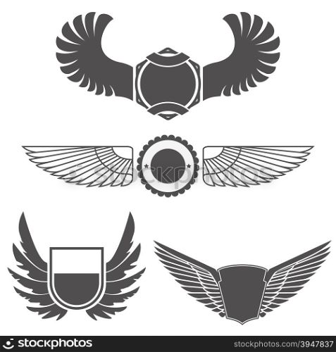 Wings with banners set on white background. Heraldic wings. Element for logo,label and emblems design. Vector illustration.