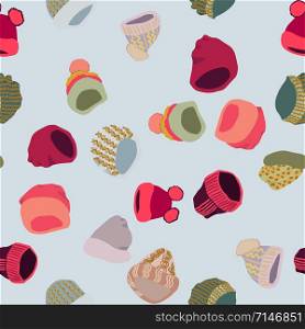 Winter headwear. Illustration of knitted hats and beanies in seamless pattern on blue background. Web, wrapping paper, textile, wallpaper design, background fill.. Illustration of knitted hats and beanies in seamless pattern on blue background