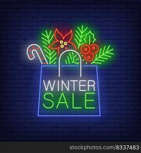 Winter sale paper bag neon sign. Shopping, paper bag, sale. Night bright advertisement. Vector illustration in neon style for banner, billboard