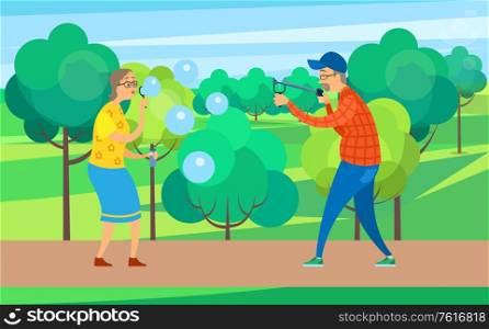 Woman blowing soap bubbles vector, grandmother and grandfather in park surrounded by trees and bushes, man with slingshot childish pensioners seniors. Happy Pensioners Senior People with Soap Bubbles