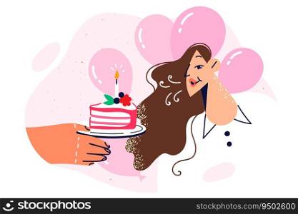 Woman celebrating birthday blows out candle on cake and makes wish while standing near festive balloons. Hands with cake for traditional ritual for birthday party with hope of fulfillment of desires. Woman celebrating birthday blows out candle on cake and makes wish standing near festive balloons