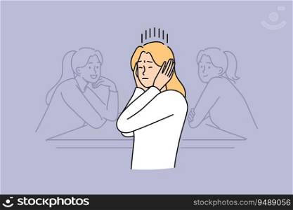 Woman covers ears by refusing to listen to statements of toxic colleagues and ignoring criticism when performing professional tasks. Girl office worker sits at table ignoring words of others. Woman covers ears by refusing to listen to statements of toxic colleagues and ignoring criticism