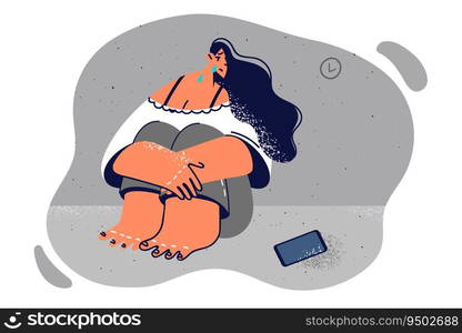 Woman cries sitting on floor near phone after talking with ex-boyfriend who left for another girlfriend. Upset girl cries and suffers from loneliness and lack of calls from friends. Woman cries sitting on floor near phone after talking with ex-boyfriend left for another girlfriend