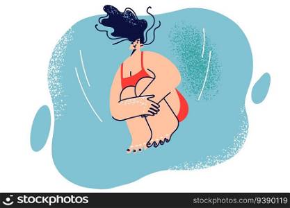 Woman dives into water and holds breath jumping from springboard and diving into deep pool. Girl in bathing suit swims in pool or sea doing summer active recreation that improves physical fitness. Woman dives into water and holds breath jumping from springboard and diving into deep pool