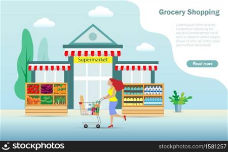 Woman enjoy shopping with shopping cart full of grocery foods Idea for supermarket, retail store and delivery concept.