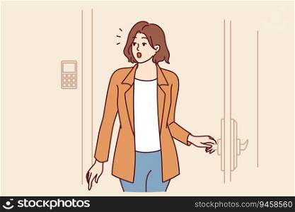 Woman enters hotel room and marvels at nice interior of temporary accommodation booked for vacation or weekend. Girl tourist stands at door of hotel apartment and looks around in surprise. Woman enters hotel room and marvels at nice interior of temporary accommodation booked for vacation